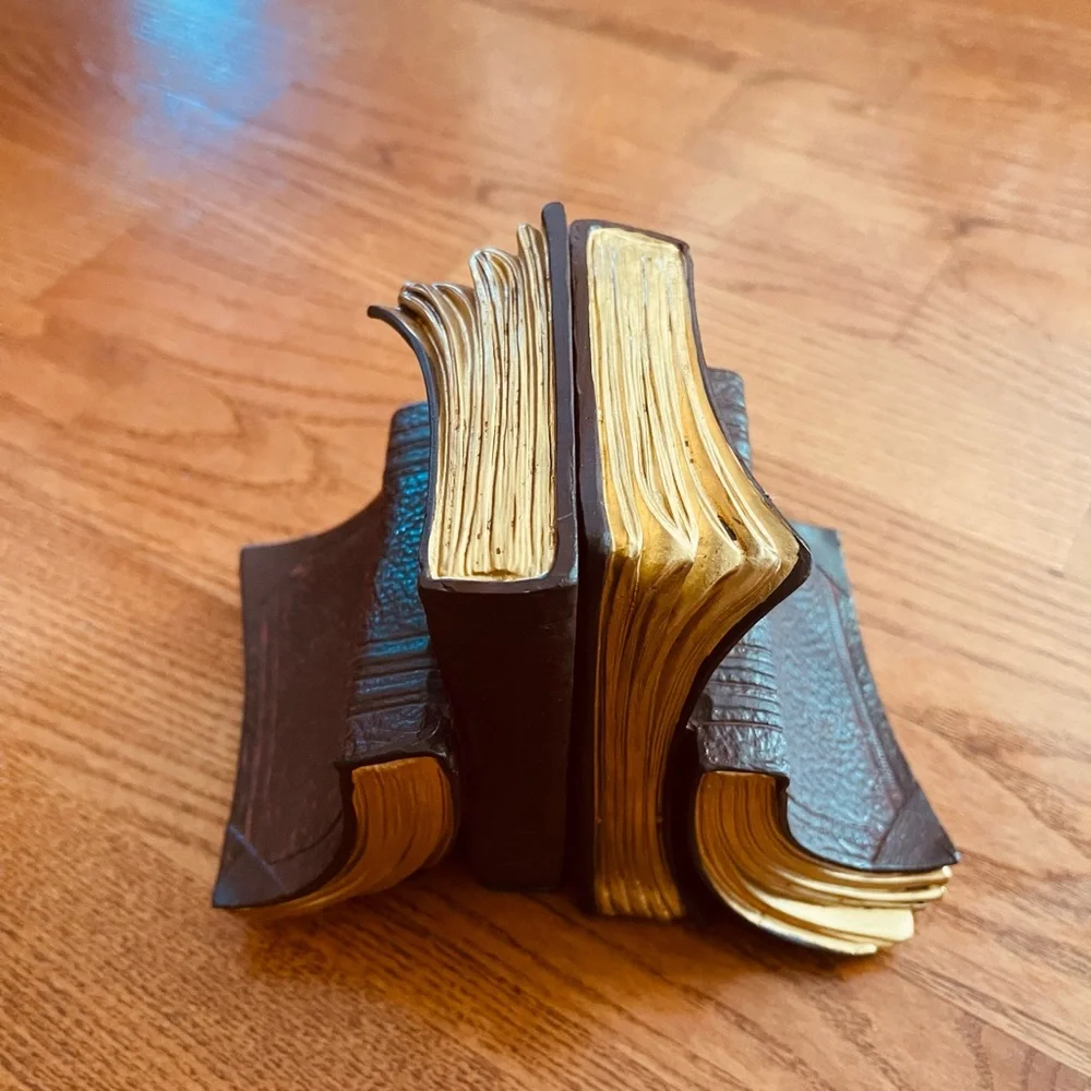 A pair of metal books bookends
